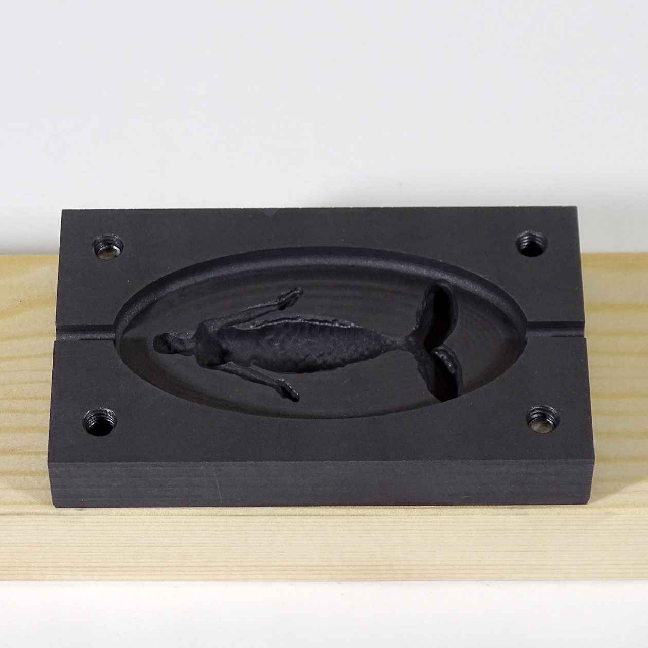 Sirena con molde de perlas de grafito Sirena con molde de perlas de grafito