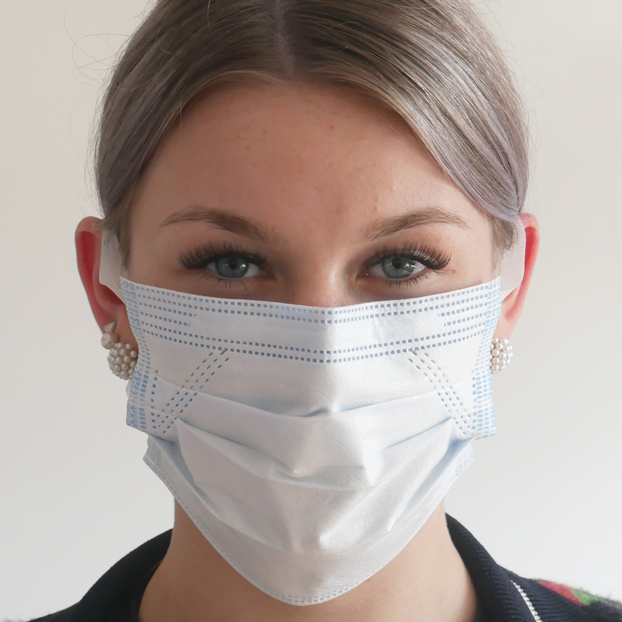 Máscara bucal y nasal con presilla de vellón para las orejas Máscara bucal y nasal con presilla de vellón para las orejas