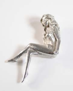Tin Figure sitting ELF
